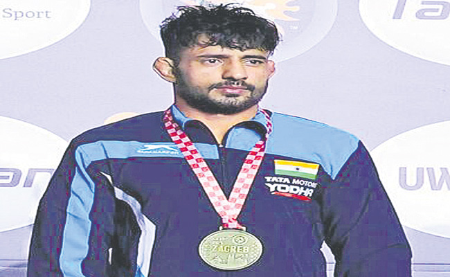 ASHU-BRONZE-RIGHT2.jpg