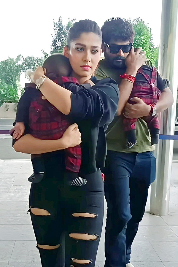 Nayanthara_20and_20Vignesh_20Shivan_20with_20their_20children_20at_20the_20airport_20Photos_4.jpg 5