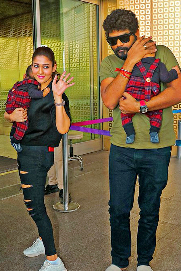 Nayanthara_20and_20Vignesh_20Shivan_20with_20their_20children_20at_20the_20airport_20Photos_5.jpg 6