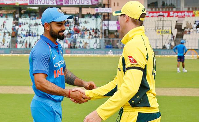 kohli-and-smith.jpg