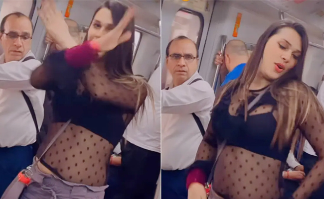 Woman_20Dancing_20To_20Bollywood_20Song_20Inside_20Delhi_20Metro.jpg