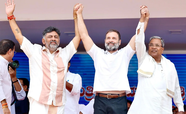 Rahul-DKS-Siddaramaiah-summ.jpg