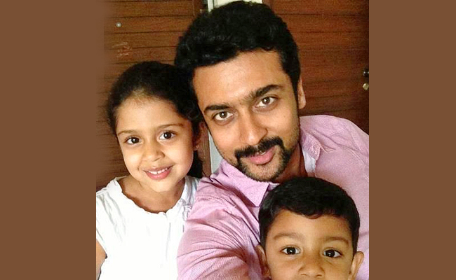 Hero_20Suriya_20With_20his_20Son_20and_20Daughter_20Photos_1.jpg 2