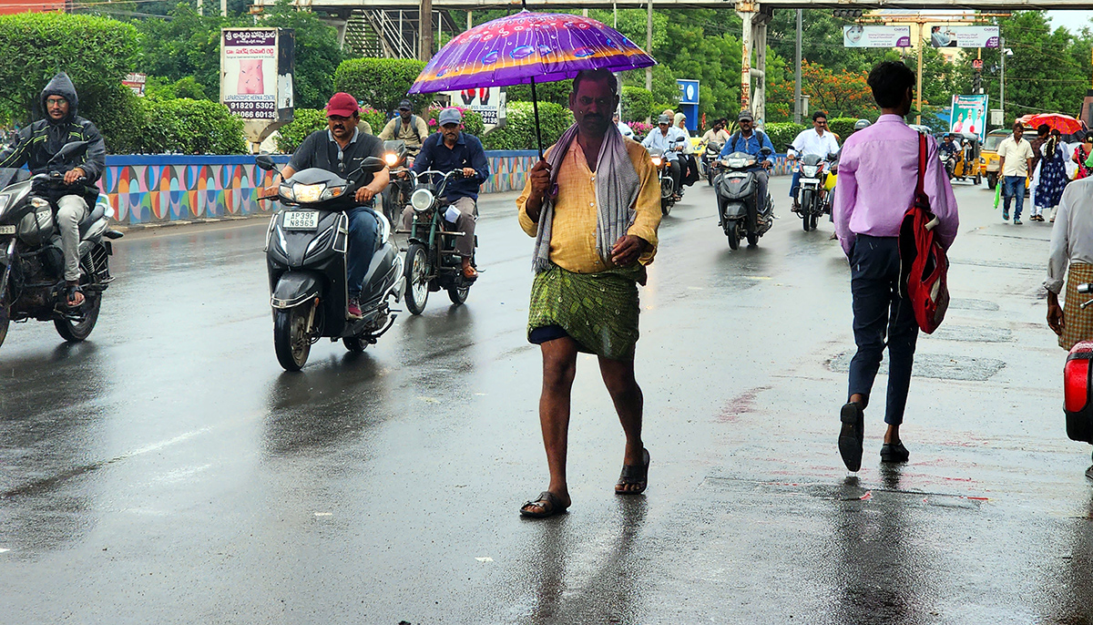 heavy_20rains_20in_20andhra_20pradesh_20pics-24.jpg 24