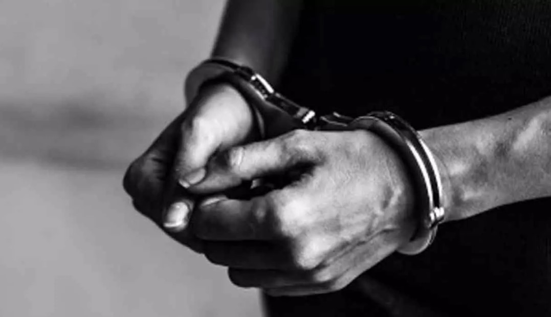 HandCuffs-Man-Steals-Money.jpg