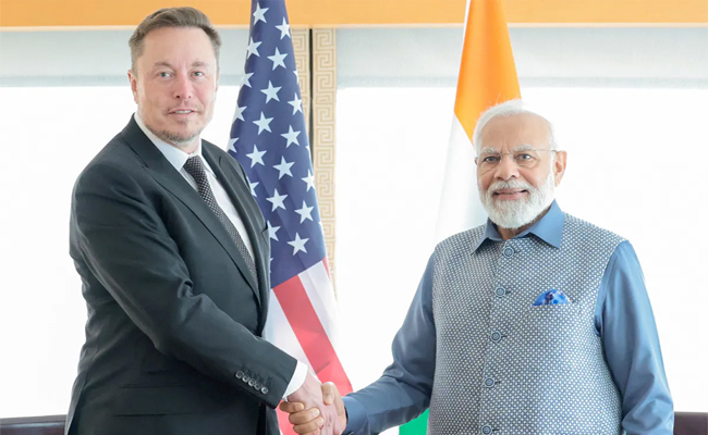 narendra_20modi_20and_20elon_20musk_20and_20tesla.jpg