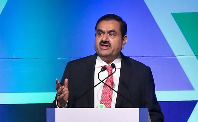 sanghi-cement-for-adani-hand.jpg
