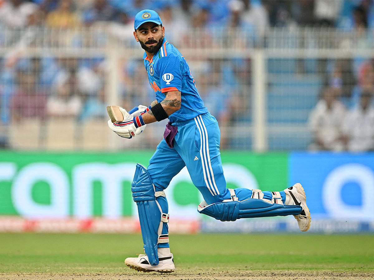 Virat_20Kohli_20Celebrates_2049_20ODI_20Century_20Photos-13.jpg 12