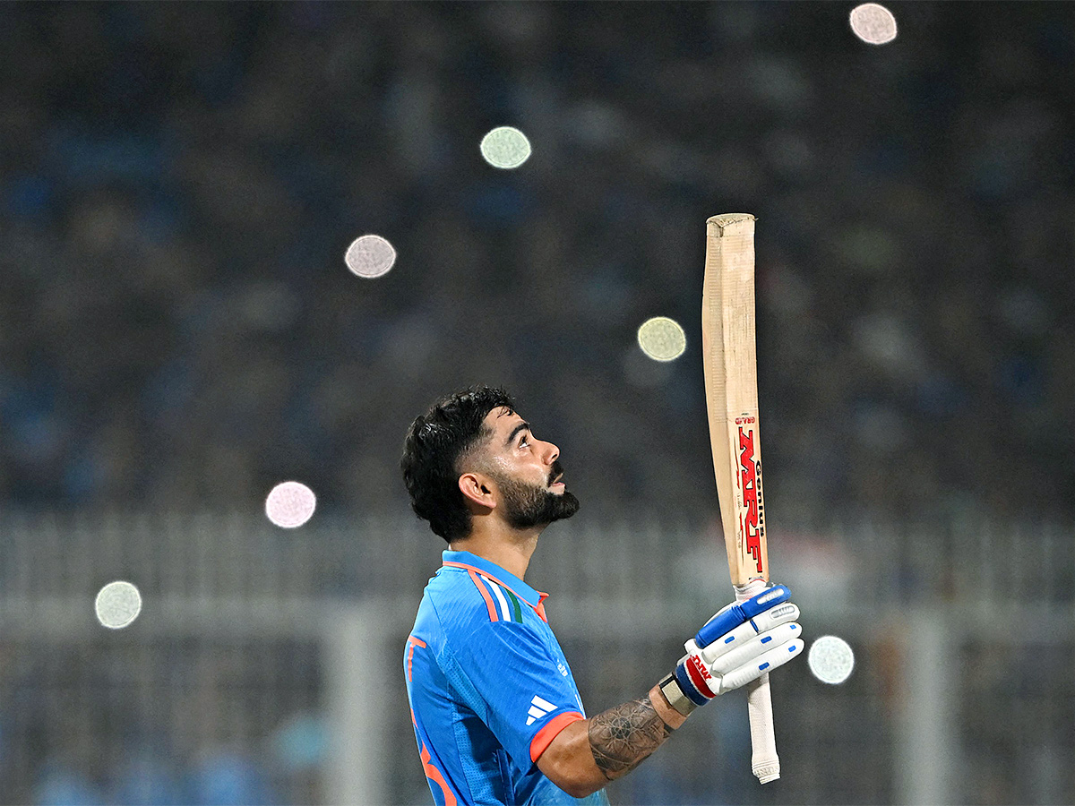 Virat_20Kohli_20Celebrates_2049_20ODI_20Century_20Photos-15.jpg 14