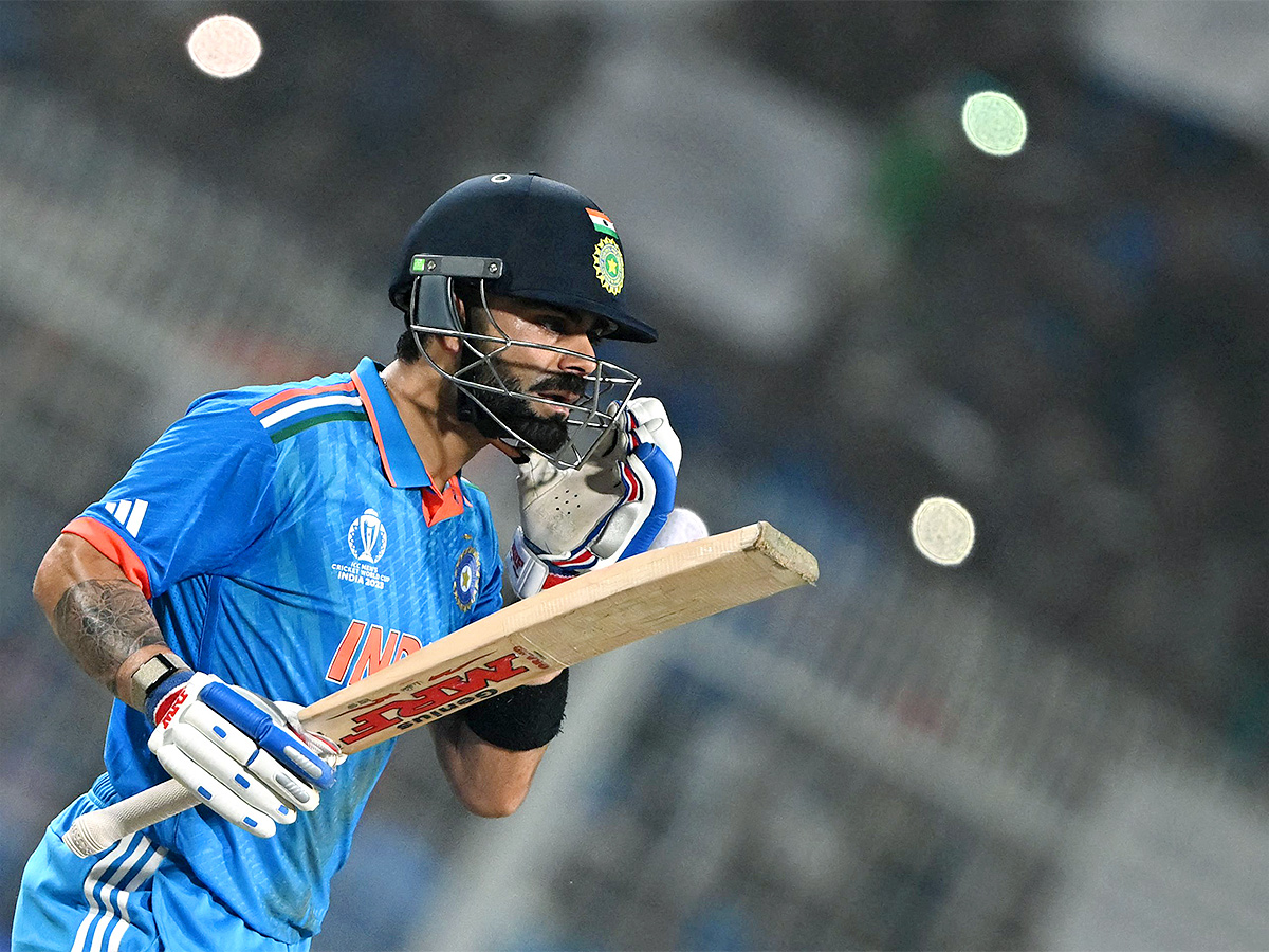 Virat_20Kohli_20Celebrates_2049_20ODI_20Century_20Photos-16.jpg 15