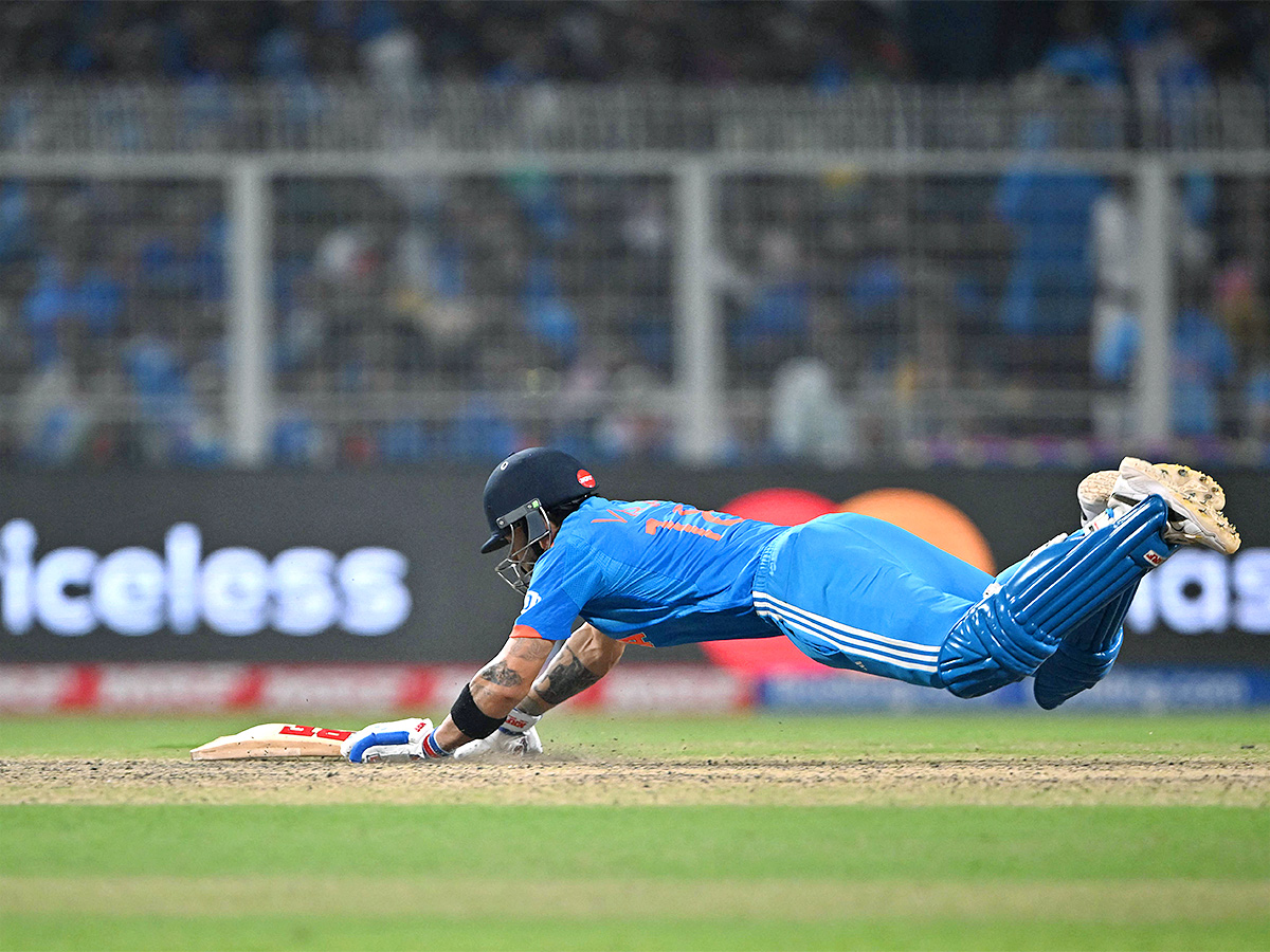 Virat_20Kohli_20Celebrates_2049_20ODI_20Century_20Photos-21.jpg 20