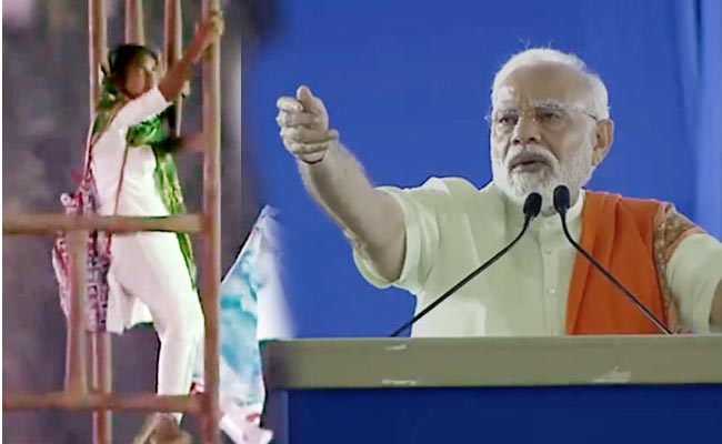 modi_Hyd_Meeting_Girl_Flood.jpg