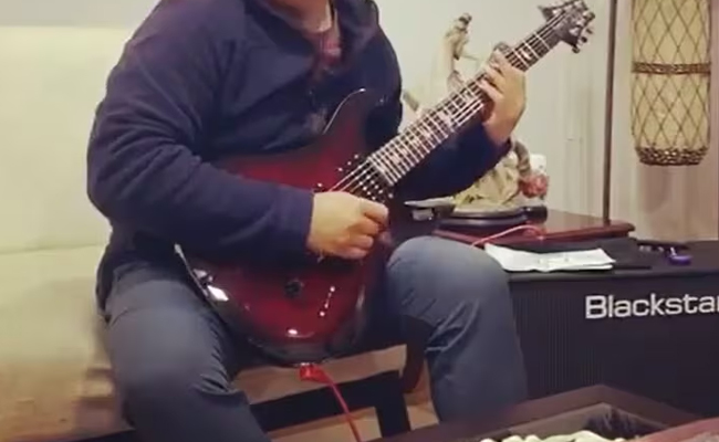 cm-playing-guitar.jpg