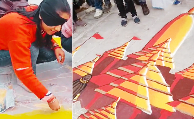 Darbhanga-Girl-Draws-Rangoli.jpg