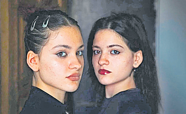 RE-UNITED-TWINS.jpg