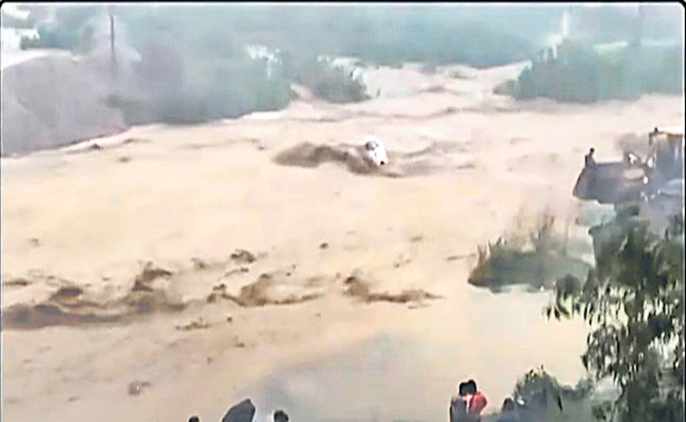 CAR-SWEPT-AWAY.jpg