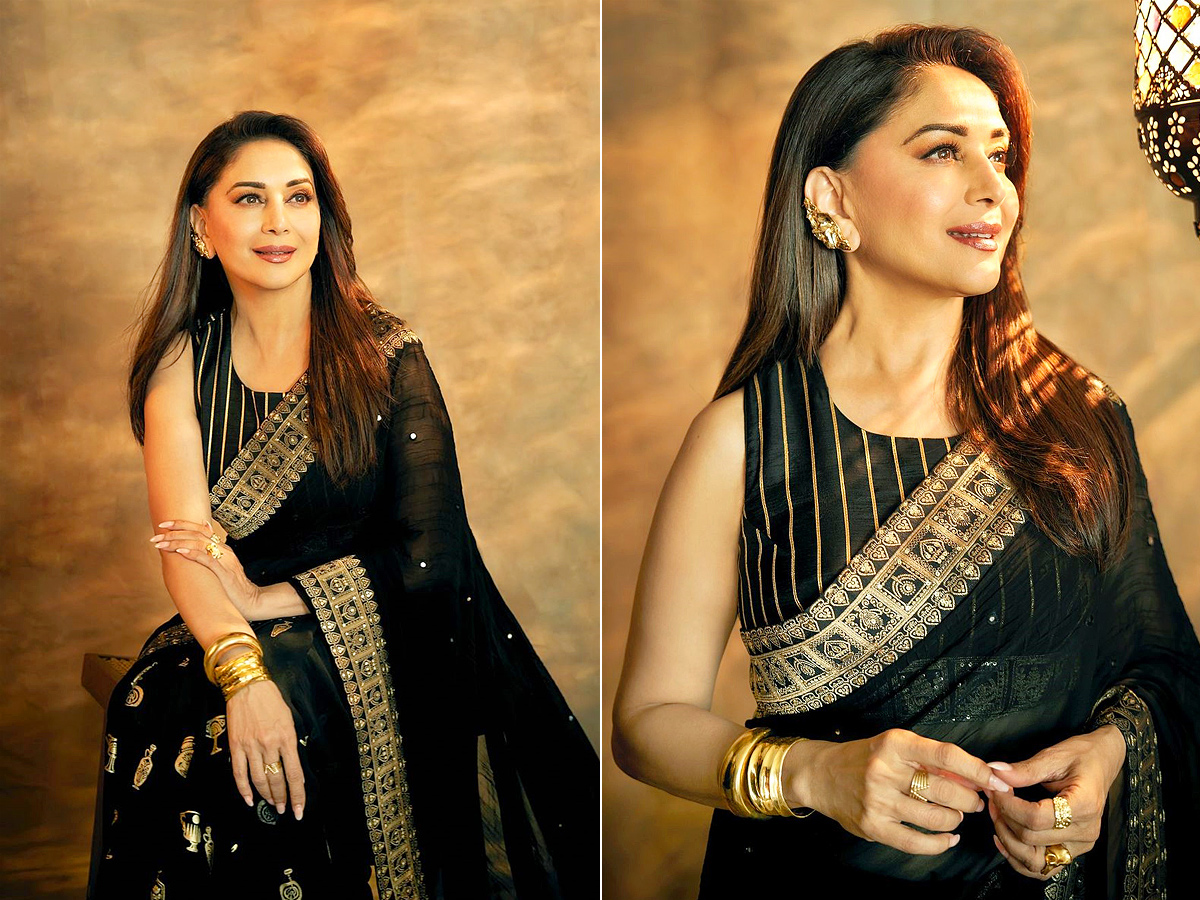 Star_20actress_20Madhuri_20Dixit_20shares_20_20magical_20Photos_20in_20black_20saree_20Photos_20_289_29.jpg 1