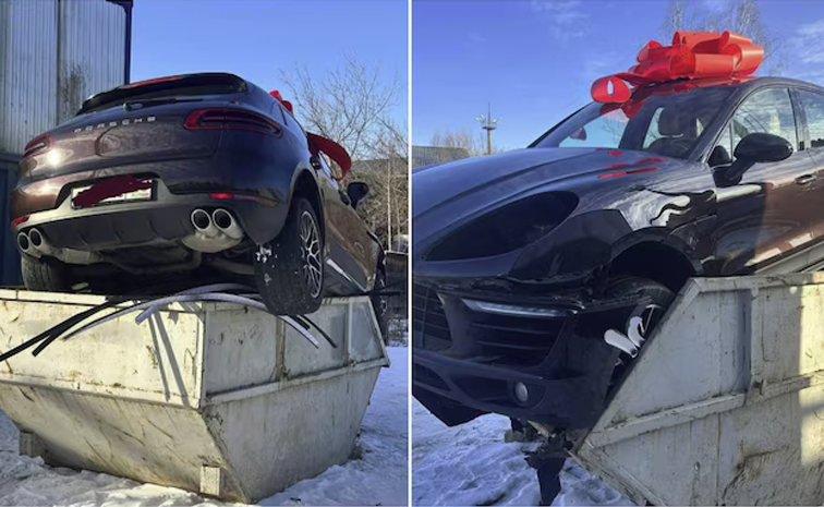 Russian_20man_20dumps_20Porschecar.jpg