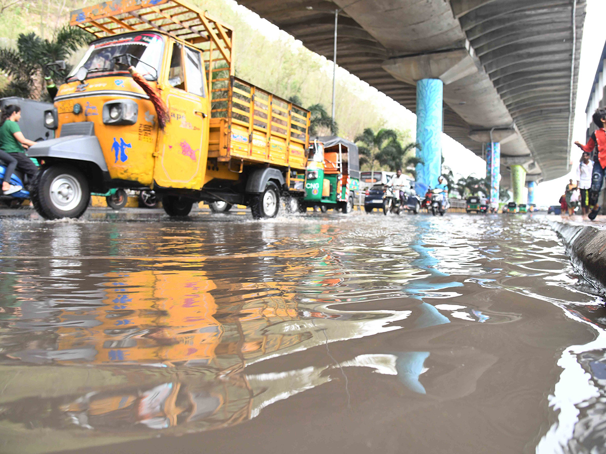 Unseasonal_20Rains_20in_20Telugu_20States_20Photos__20_283_29.jpg 3
