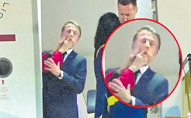 MACRON-SLAPPED.jpg
