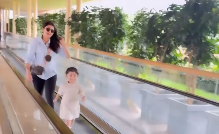 Actress_20Pranitha_20Enjoy_20At_20Bangalore_20Airport_20with_20Her_20Daughter_20Photos_20_282_29.jpg 6