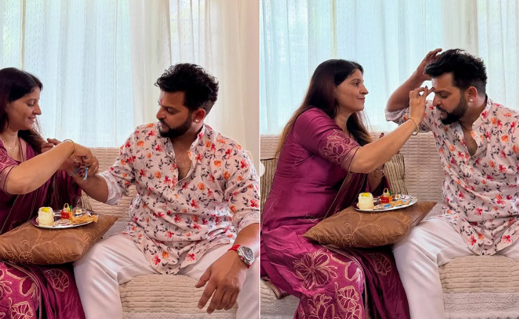 cricketers_20Tying_20Rakhi_20with_20Their_20sisters_20Photos_20_2810_29.jpg 12