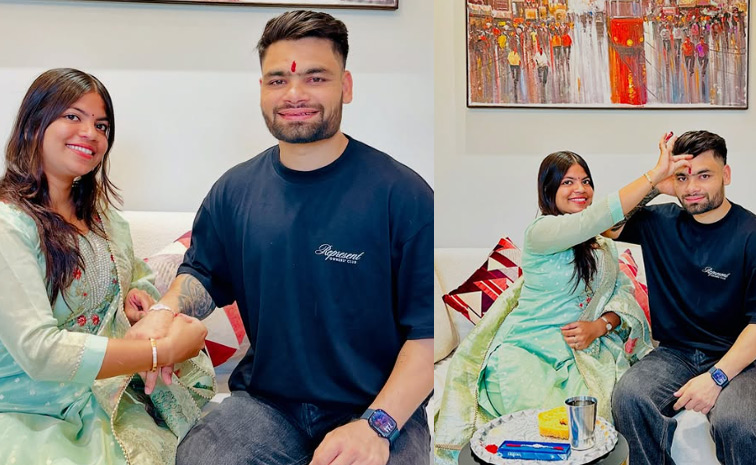 cricketers_20Tying_20Rakhi_20with_20Their_20sisters_20Photos_20_286_29.jpg 8