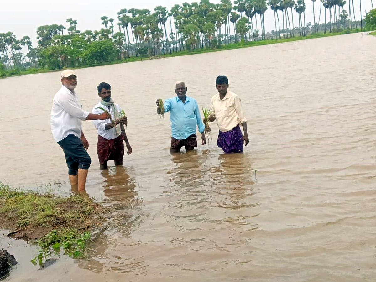 Heavy_20Rains_20In_20Telugu_20States_20Photos_20_2818_29.jpg 19