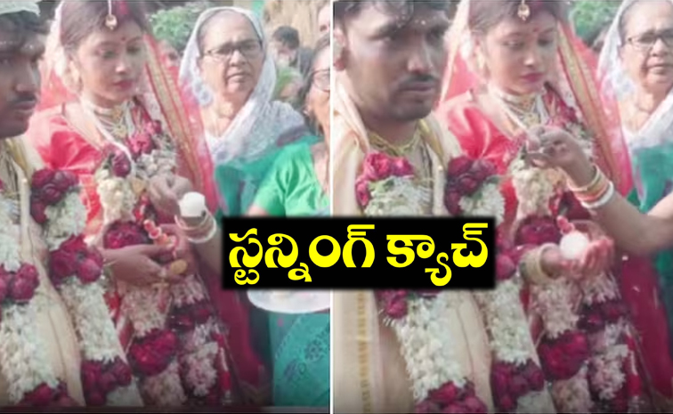 Bride-rasgulla-catch.jpg
