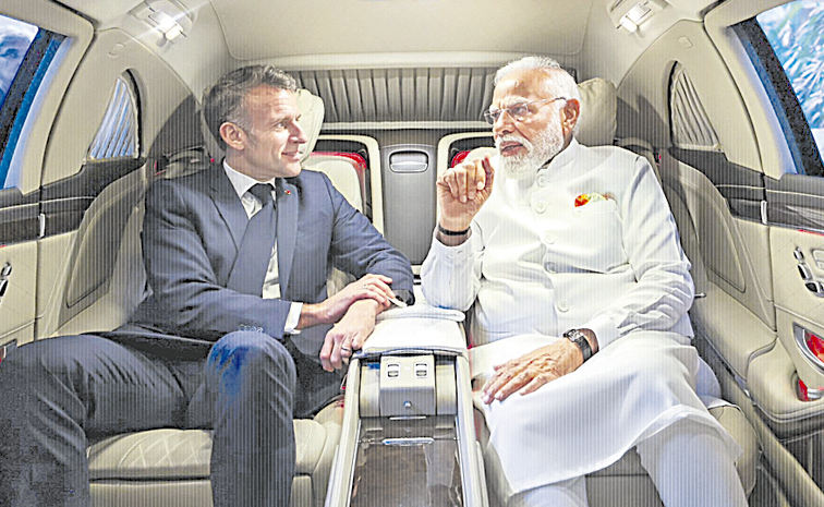 MACRON-MODI.jpg