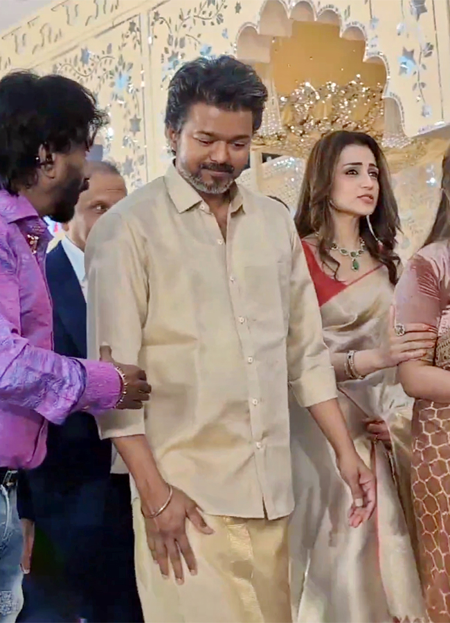 Actor_20and_20TVK_20chief_20Vijay_20attends_20wedding_20reception_20with_20Trisha__20_2816_29.jpg 16