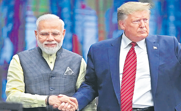 modi-and-trump-hans-shaking.jpg