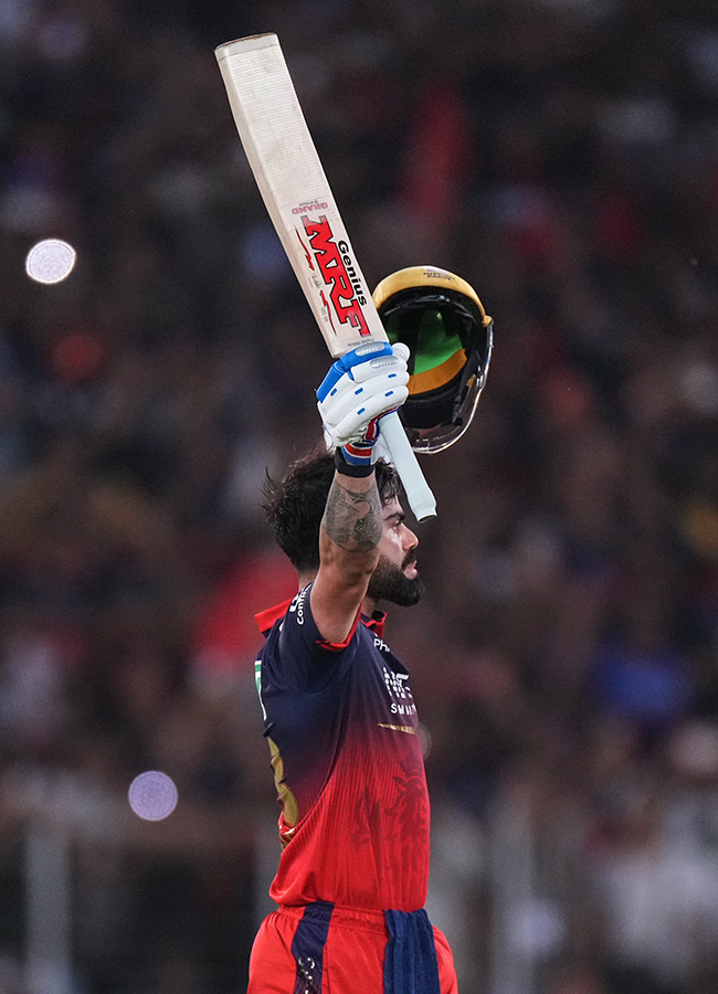IPL_202026_20_20RCB_20_20Players_20Celebrate_20With_20the_20Trophy_20After_20Winning__20_2812_29.jpg 12