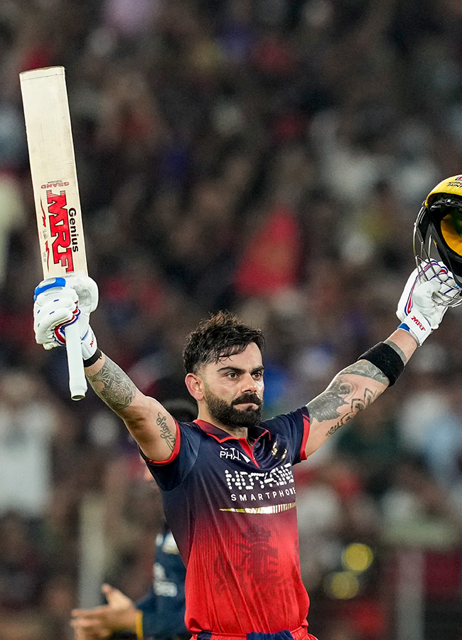 IPL_202026_20_20RCB_20_20Players_20Celebrate_20With_20the_20Trophy_20After_20Winning__20_2816_29.jpg 16