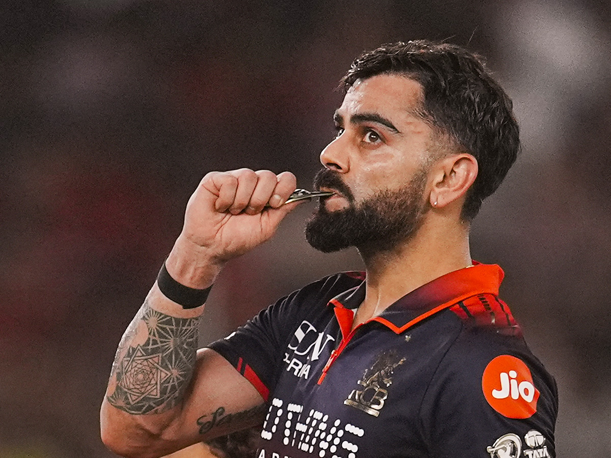 IPL_202026_20_20RCB_20_20Players_20Celebrate_20With_20the_20Trophy_20After_20Winning__20_2824_29.jpg 24