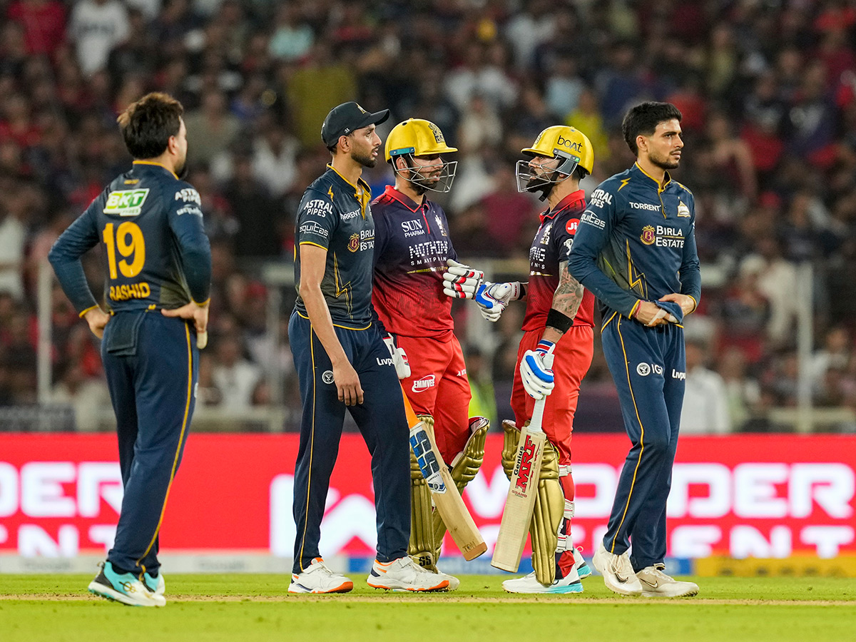 IPL_202026_20_20RCB_20_20Players_20Celebrate_20With_20the_20Trophy_20After_20Winning__20_2825_29.jpg 25