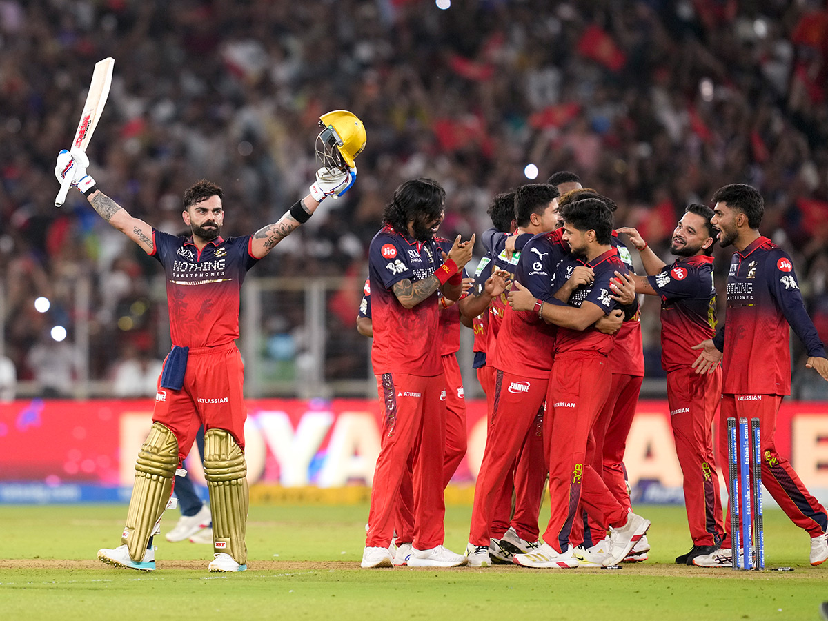 IPL_202026_20_20RCB_20_20Players_20Celebrate_20With_20the_20Trophy_20After_20Winning__20_2827_29.jpg 27