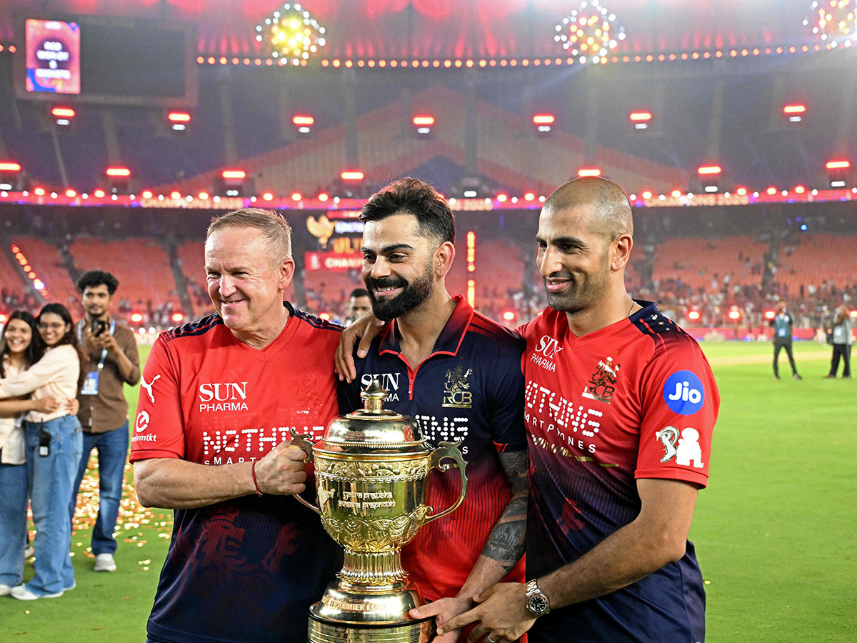 IPL_202026_20_20RCB_20_20Players_20Celebrate_20With_20the_20Trophy_20After_20Winning__20_289_29.jpg 9
