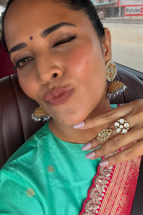 Simple_20superb_20stylish_20cute_20smile_20And_20beautiful_20saree_20looking_20By_20Actress_20And_20anchor_20Anasuya_20Photos_20_2813_29.jpg 14
