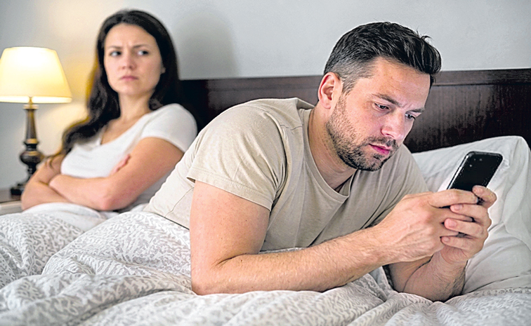 Husband-with-Cell-Phone.jpg