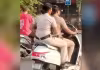 హెల్మెట్ లేకుండా స్కూటీ నడిపిన మహిళా పోలీసులు.. నెటిజన్ల ఫైర్..