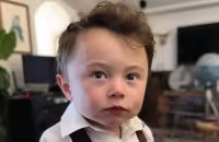 elon musk ai generated photo as a small boy - Sakshi
