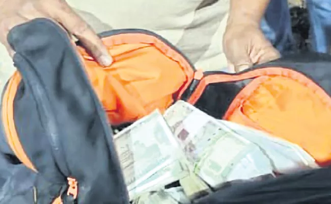 IT dept raids 16 Crores in Bengaluru - Sakshi